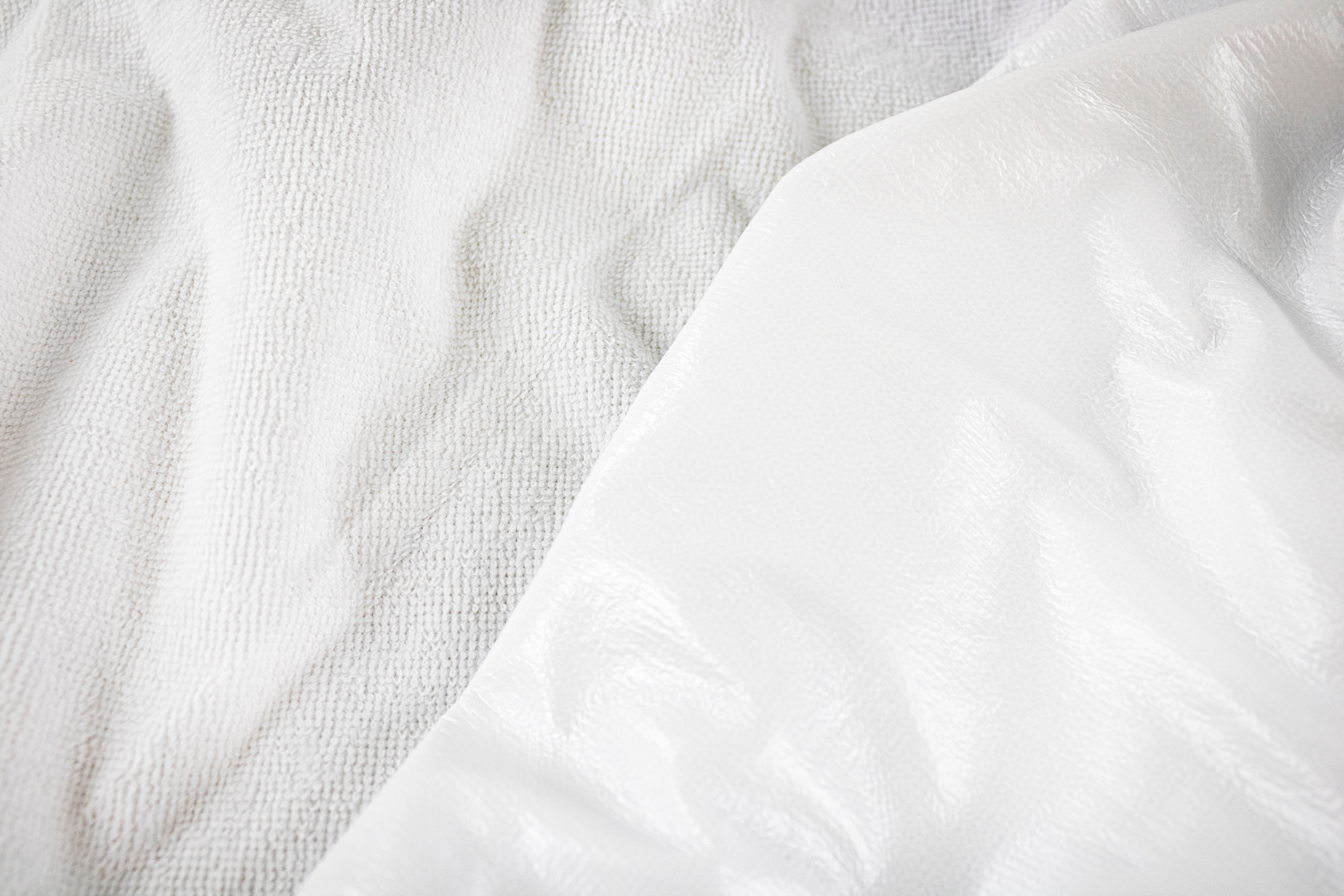 White texture close-up of material for making waterproof mattres Premium Waterproof Mattress Protector by Renee Taylor Super King - Image 1