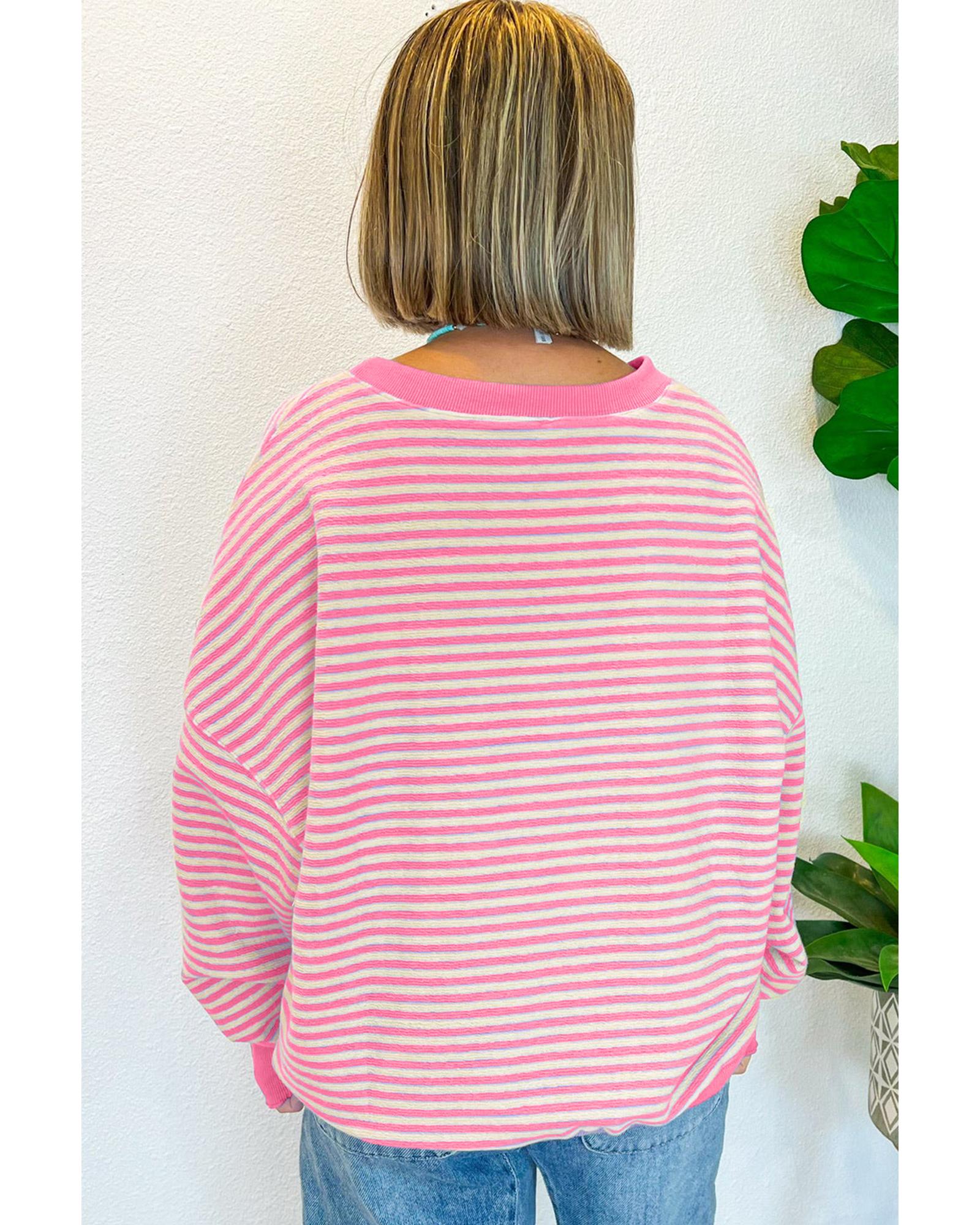 V539-AZEXDC25130845-P1019-XL-202508271950-00 Azura Exchange Pink Stripe Santa Clause Print Drop Shoulder Long Sleeve Loose Top - XL - Image 1