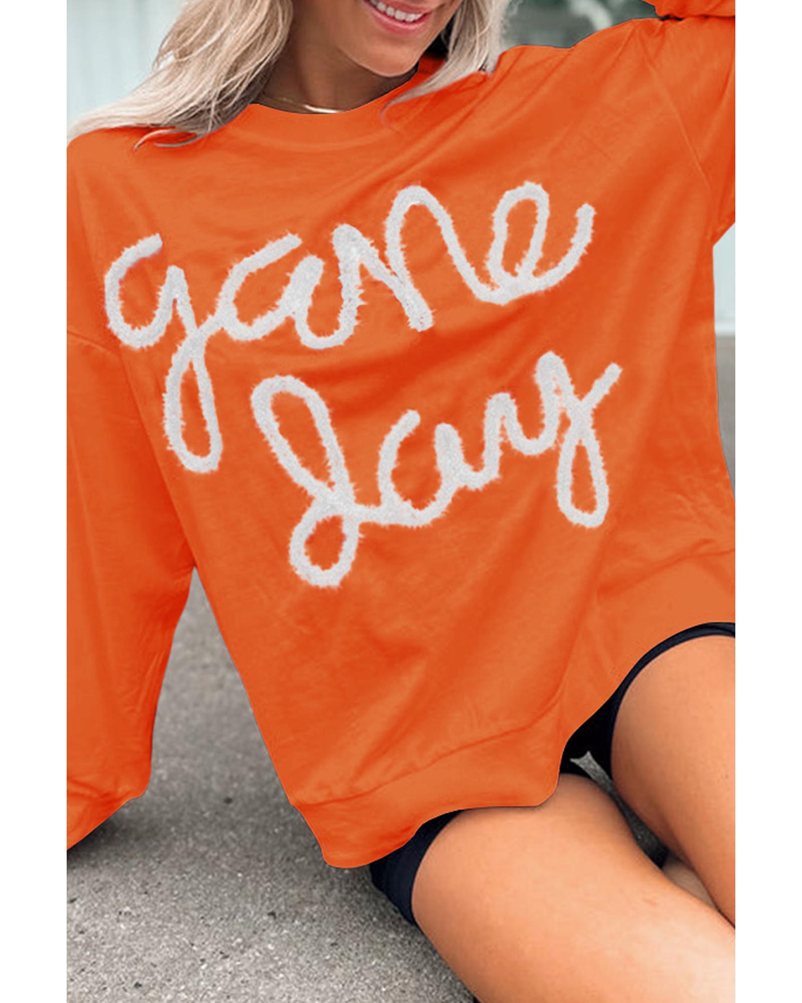 V539-AZEXDC25317536-P7014-M-202508280655-00 Russet Orange Tinsel Game Day Drop Shoulder Graphic Sweatshirt - M - Image 1