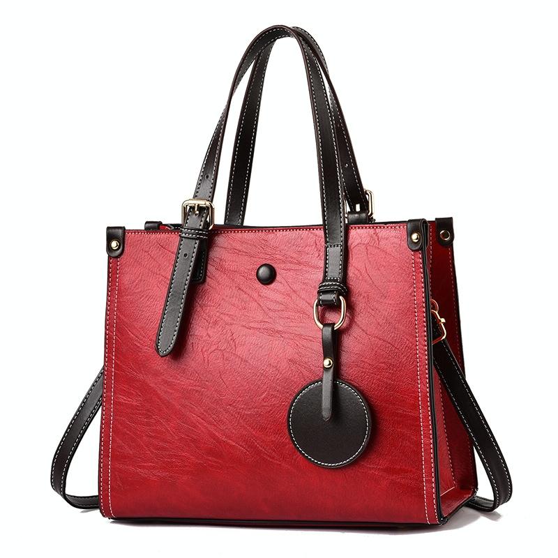 V562-A1050232060DBT-202504251638-00 Vintage Multifunctional Handbag for Women - Red - Image 1