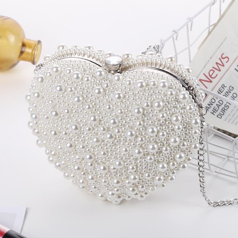 V562-A1071942060DBT-202505191510-00 White Heart Shaped Evening Clutch With Chain - Image 1