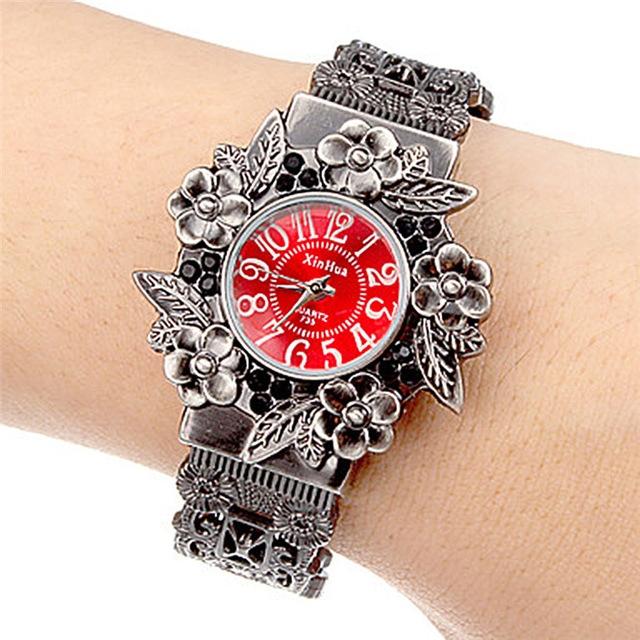 V562-B103779280DBT-227124-00 Flower Embossed Retro Bracelet Watch - Women Quartz - Red - Image 1