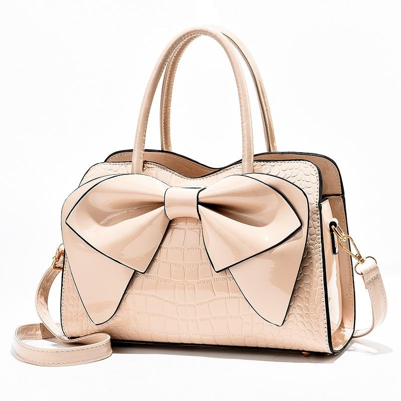V562-C1040232060DBT-202504251548-00 Leather Ladies Handbag - Bright Bow Design - Khaki - Image 1