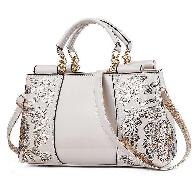 V562-D1088132060DBT-202503041335-00 Shiny Leather Handbag with Single-sided Embroidery - Rice-White - Image 1