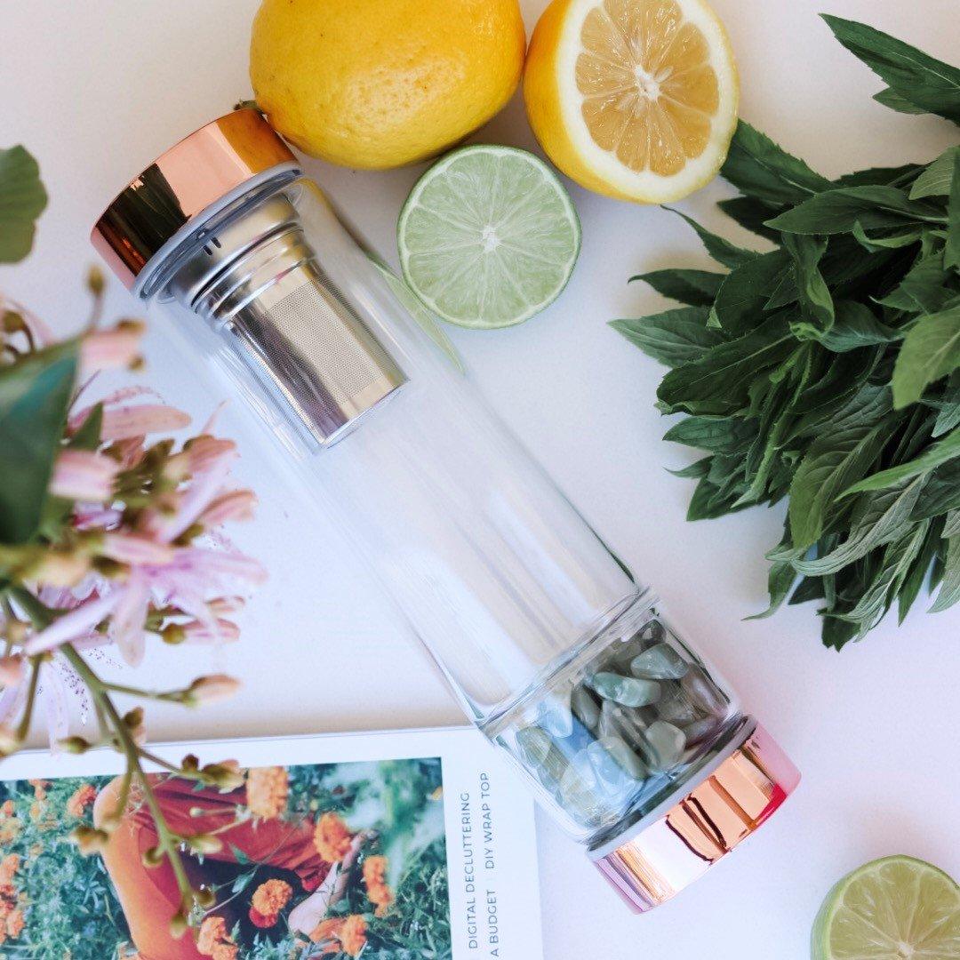 V573-CWBGBCT-140186-00 Rose Gold Crystal Bottle with Gemstone Base and Tea Infuser - Image 1