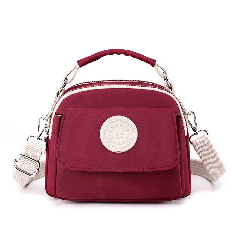 V888-ELOSUNG15514-214163-00 Red Compact Nylon Crossbody Bag - Stylish and Versatile Shoulder Purse - Image 1