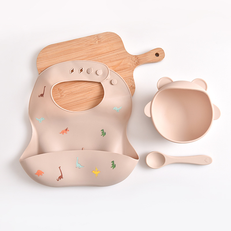 V888-ELOSUNG17459-216113-00 Dinosaur Pattern Beige Soft and Safe Silicone Baby Feeding Set - Bib, Bowl, and Spoon Combo for Mess-Free Meals - Image 1