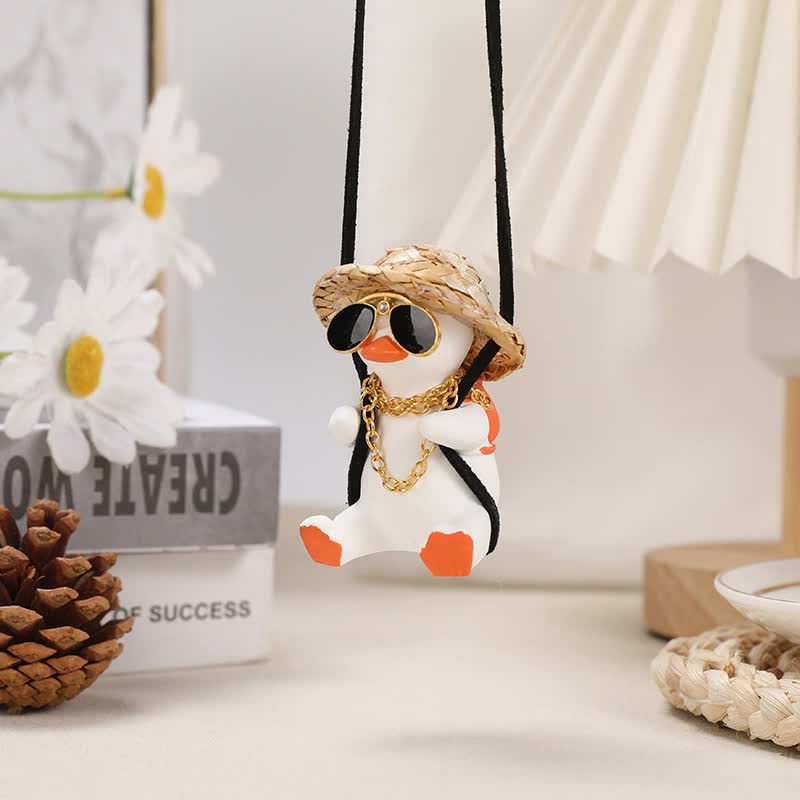 V888-ELOSUNG20376-226762-00 White+Orange 2 pcs Rocking Duck Car Ornament - Cute duck figurine with hat and small school bag, car interior decoration - Image 1