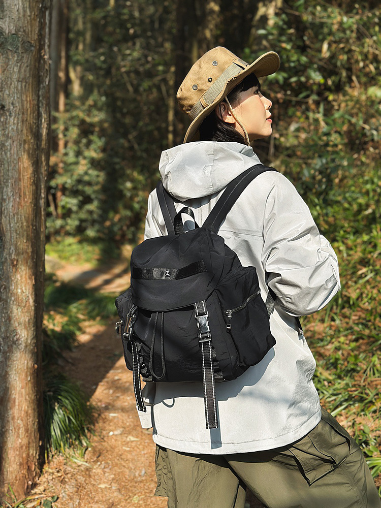 V888-ELOSUNG22933-202504141531-00 Black Lightweight Nylon Backpack - Water Resistant Travel Daypack for Women & Men - Image 1