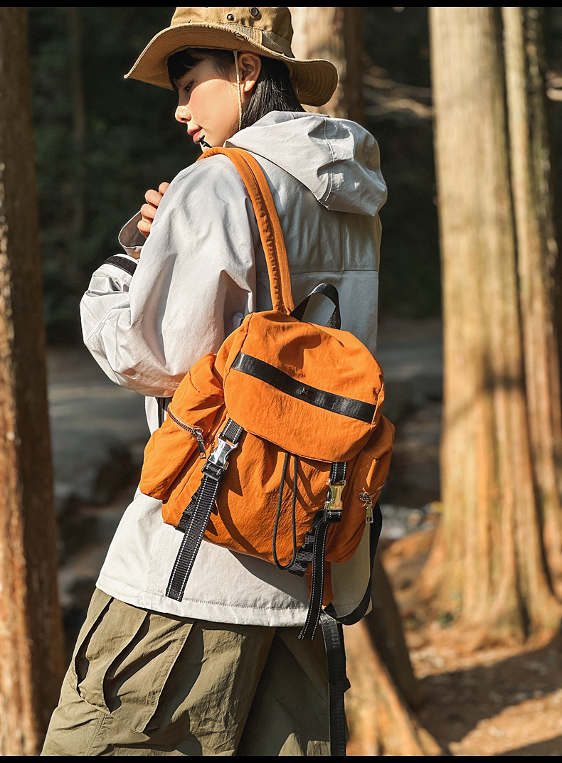 V888-ELOSUNG22936-202504141532-00 Brown Lightweight Nylon Backpack - Water Resistant Travel Daypack for Women & Men - Image 1