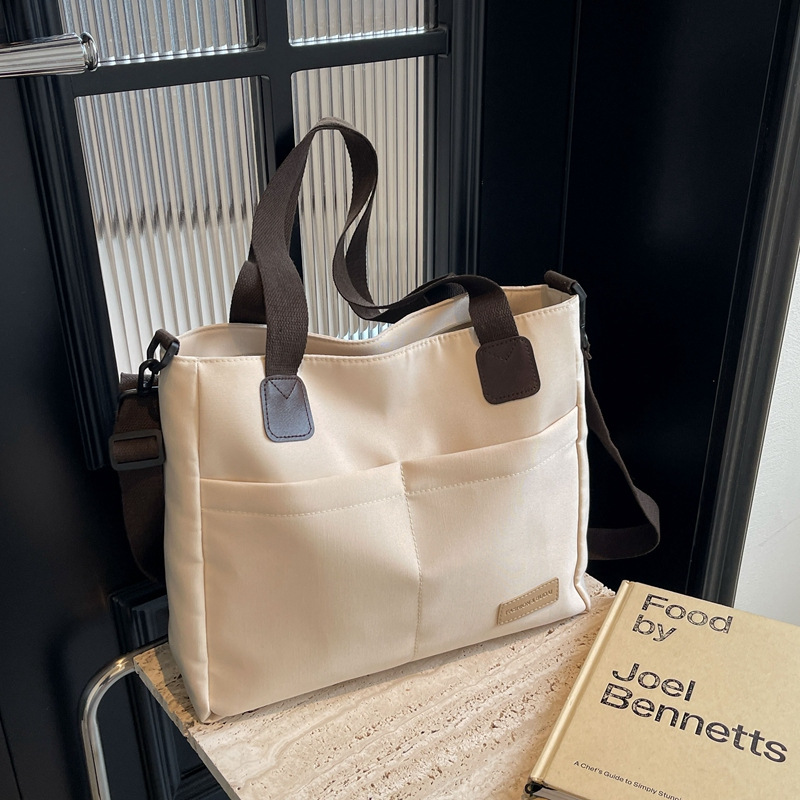 V888-ELOSUNG25001-202504141432-00 Stylish white canvas tote bag with detachable shoulder strap - Image 1