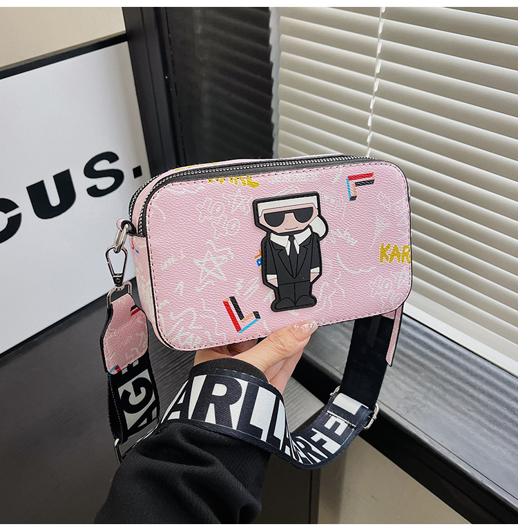 V888-ELOSUNG26775-202505131931-00 Pink Unique Doodle Print PU Leather Bag - Lightweight Crossbody with Character - Image 1