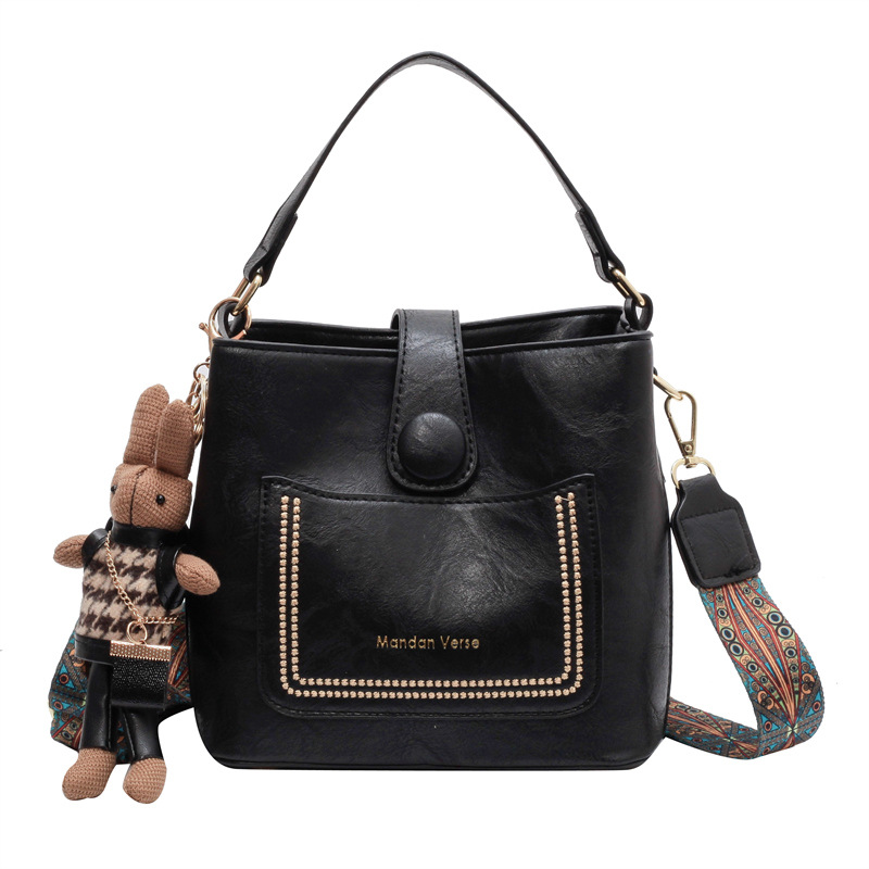 V888-ELOSUNG29853-202506191131-00 Vintage Style PU Leather Bucket Bag with Wide Patterned Strap & Optional Bunny Charm(black) - Image 1