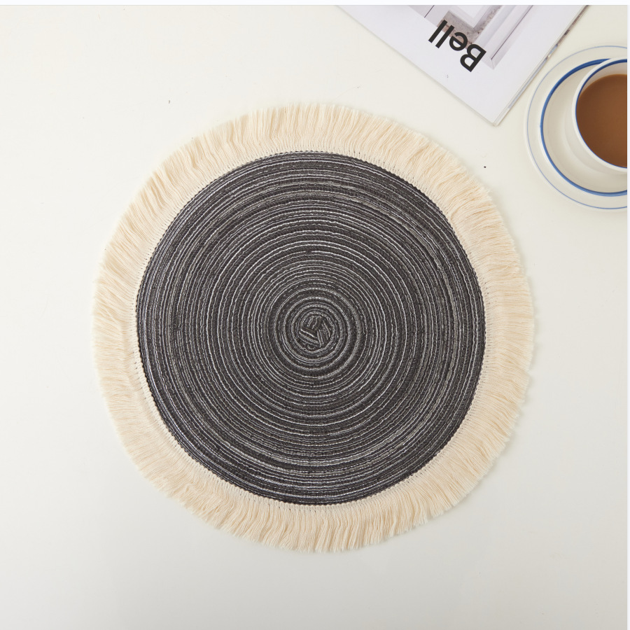 V888-ELOSUNG32082-202505281117-00 Grey Chic Round Woven Placemats with Tassel Fringe - Set of 4, Cotton Ramie Blend, Heat Resistant Table Mats - Image 1