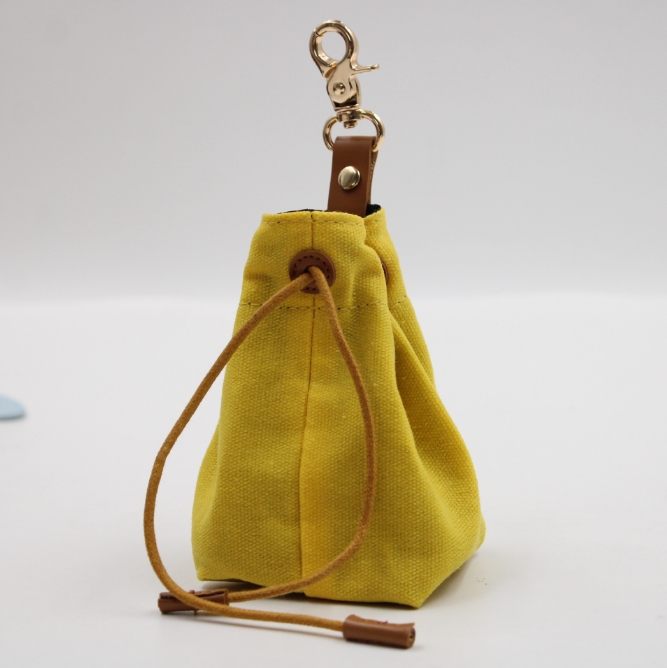 V888-ELOSUNG34316-202506301053-00 2-PCS Yellow Clip-On Canvas Dog Treat Pouch - Portable Drawstring Bag for Training & Walks - Image 1