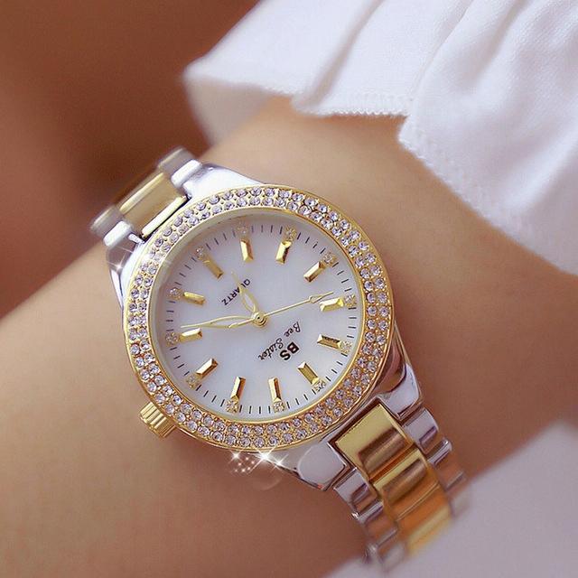 V562-A106874270DBT-202508281232-00 Women Round Diamond Watch with Alloy Strap - Interval Gold - Image 1