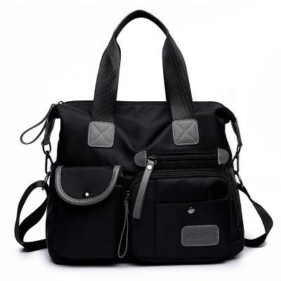 V562-B1012792550DBT-202508281627-00 Versatile Oxford Cloth Shoulder Bag for Women - Black - Image 1