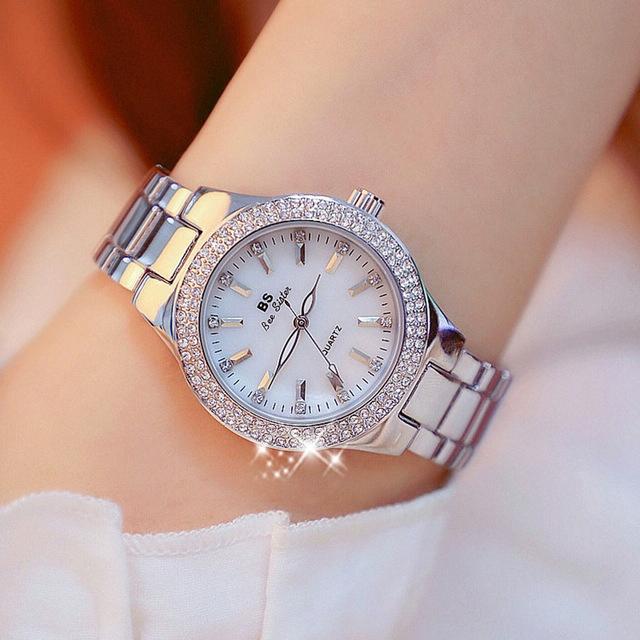 V562-C106874270DBT-202508281231-00 Women Round Diamond Watch with Alloy Strap - Silver - Image 1
